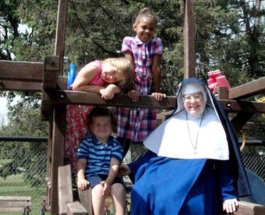 smiling Sister with children
